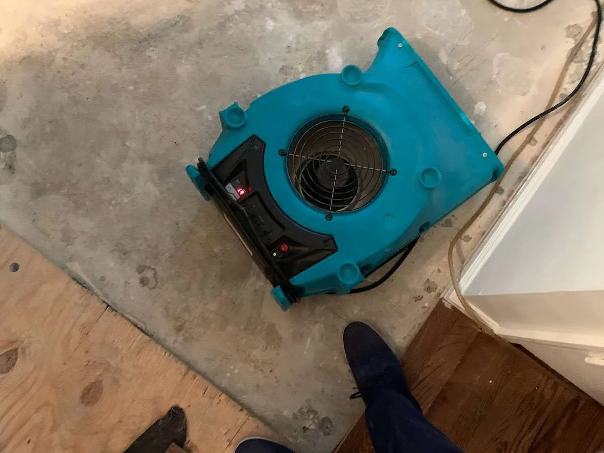Air mover drying subfloor during Leak Detection & Repair in Tellico Village